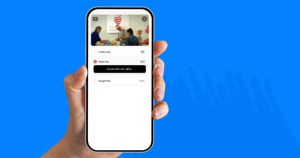Person holding iPhone with payment options - including Apple Pay and Google Pay
